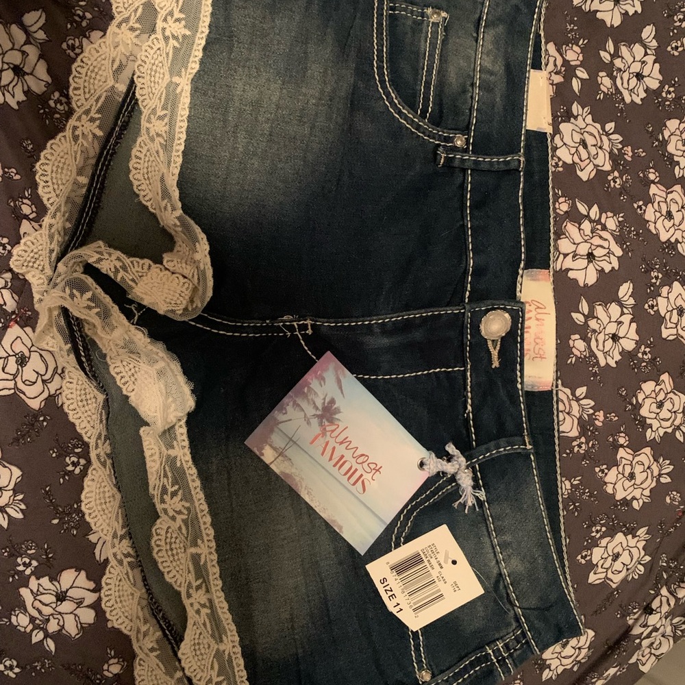 NWT Almost Famous shorts with lace bottoms and white stitching Size 11